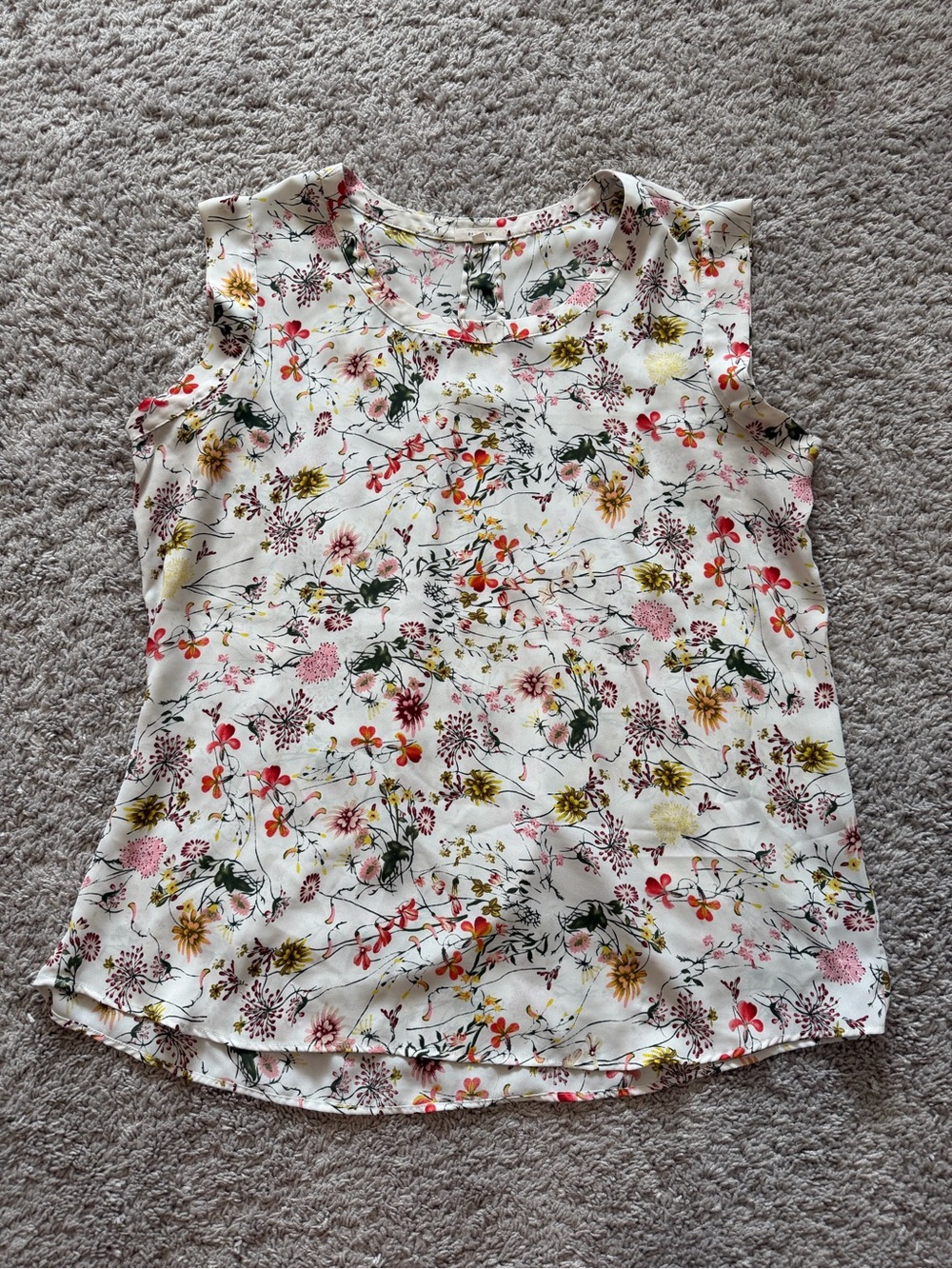 Pleione White Floral Sleeveless Blouse with Multicolor Blooms